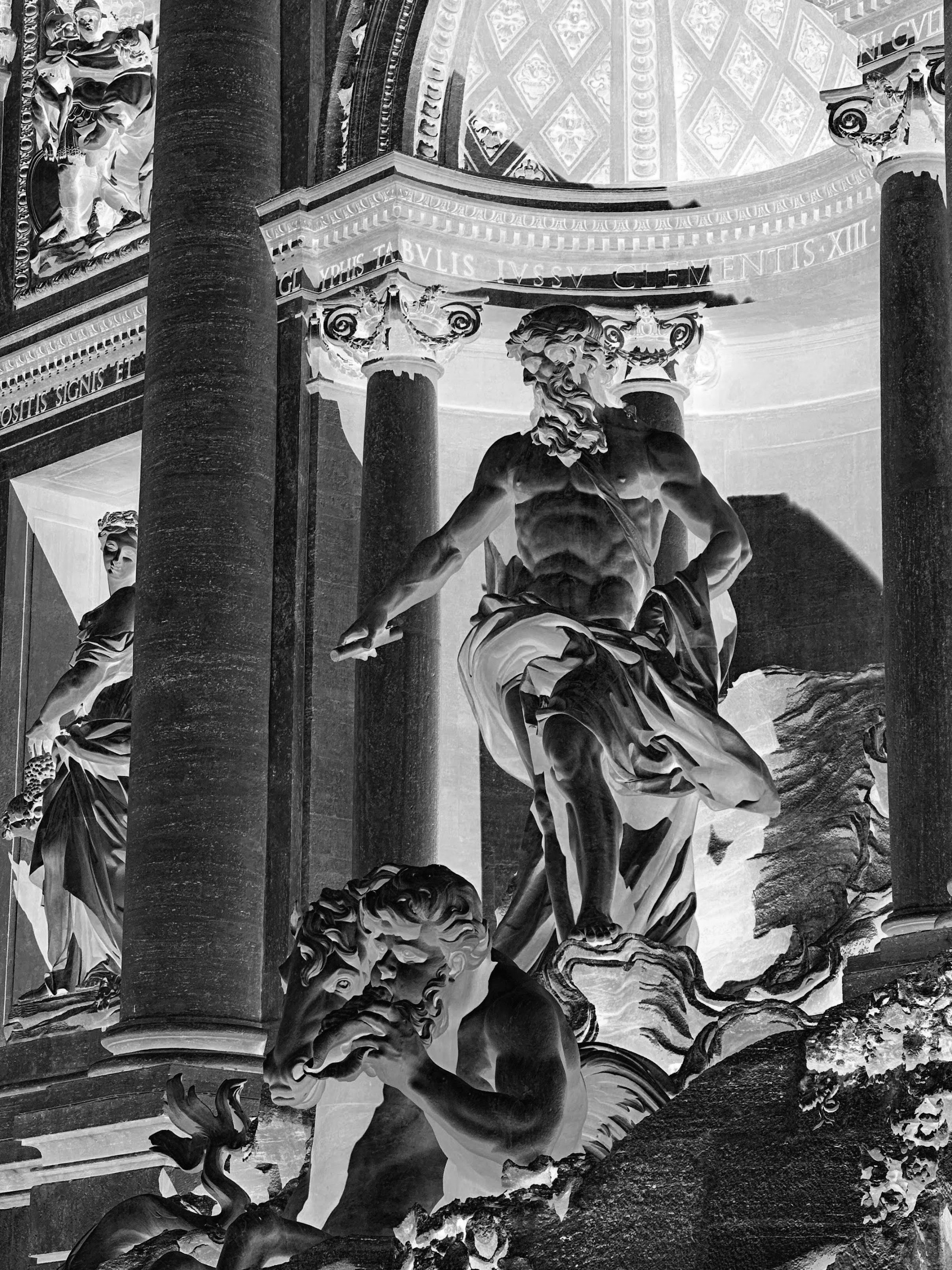 A close-up of a baroque fountain showing a muscular central figure flanked by columns and sculptural details, rendered in negative.